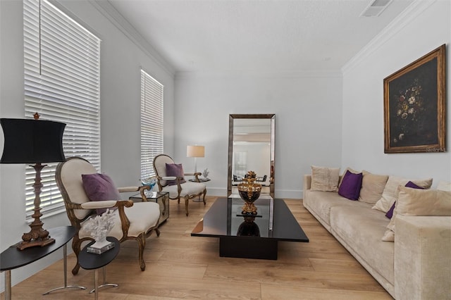 933 Jasmine St, Celebration, FL 34747 - living area with crown molding, light wood-style flooring, and healthy amount of natural light