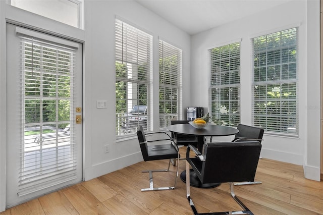 933 Jasmine St, Celebration, FL 34747 - dining area with wood finished floors and plenty of natural light