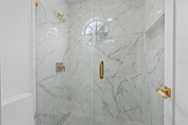 933 Jasmine St, Celebration, FL 34747 - bathroom featuring a marble finish shower