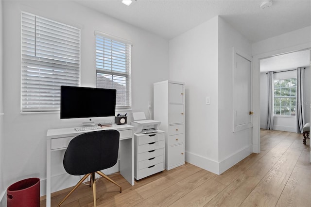 933 Jasmine St, Celebration, FL 34747 - office with light wood-style flooring and baseboards