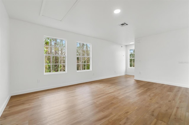 933 Jasmine St, Celebration, FL 34747 - empty room with light wood-style flooring and baseboards