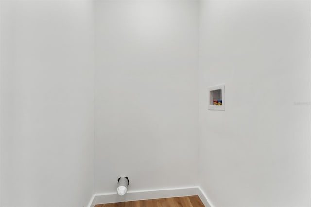 933 Jasmine St, Celebration, FL 34747 - laundry area featuring hookup for a washing machine and wood finished floors