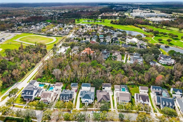 933 Jasmine St, Celebration, FL 34747 - aerial view of property's location with nearby suburban area, a nearby body of water, and a golf club