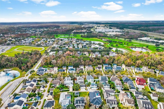 933 Jasmine St, Celebration, FL 34747 - aerial overview of property's location with a large body of water, nearby suburban area, and a local golf course