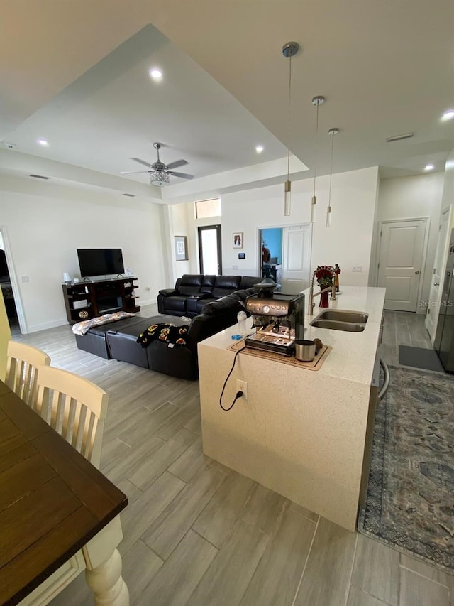 2408 Conroy Ave N, Lehigh Acres, FL 33971 - living room with ceiling fan, recessed lighting, and wood finished floors