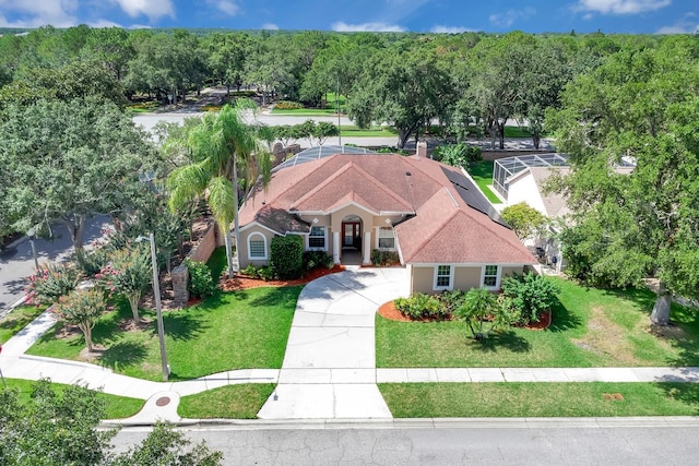 2402 Raven Croft Ct, Orlando, FL 32837 - view of front of house featuring a front lawn and stucco siding