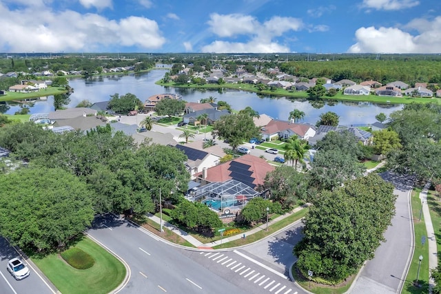 2402 Raven Croft Ct, Orlando, FL 32837 - aerial perspective of suburban area with a nearby body of water
