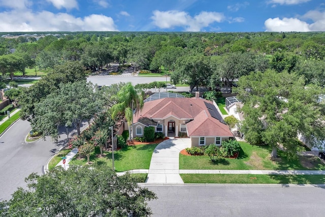 2402 Raven Croft Ct, Orlando, FL 32837 - aerial view of property and surrounding area with a heavily wooded area
