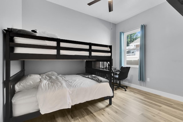 2402 Raven Croft Ct, Orlando, FL 32837 - bedroom with wood finished floors and a ceiling fan