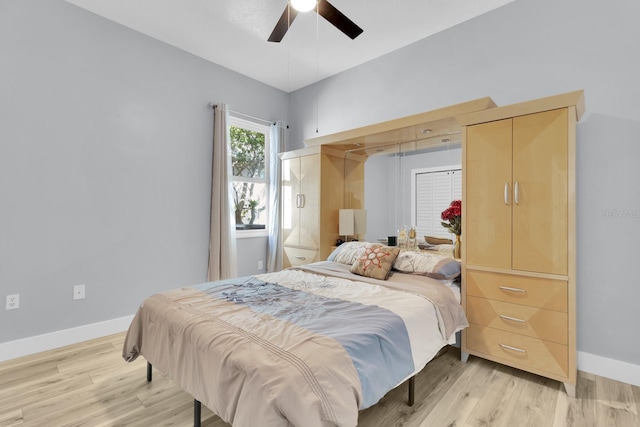 2402 Raven Croft Ct, Orlando, FL 32837 - bedroom featuring light wood-type flooring and a ceiling fan