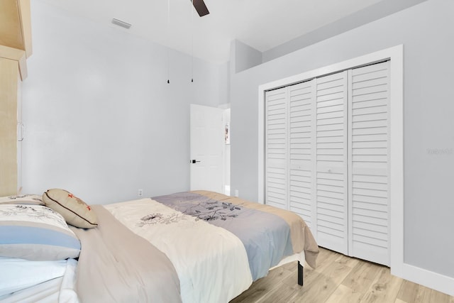 2402 Raven Croft Ct, Orlando, FL 32837 - bedroom featuring wood finished floors, a closet, and a ceiling fan