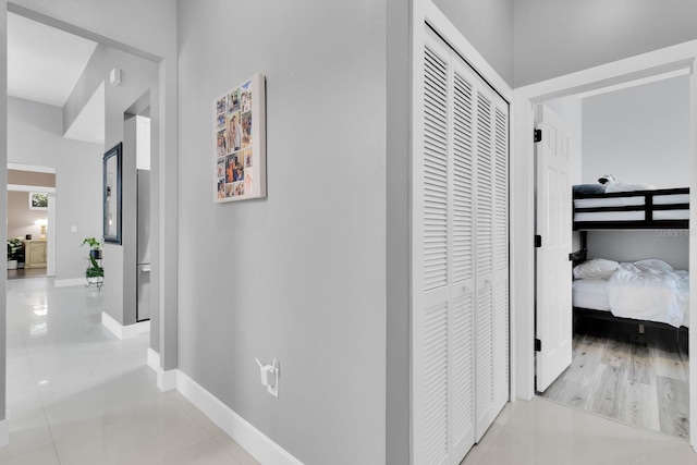 2402 Raven Croft Ct, Orlando, FL 32837 - hallway with light tile patterned flooring