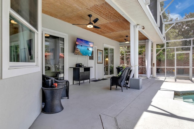 2402 Raven Croft Ct, Orlando, FL 32837 - view of patio featuring ceiling fan and glass enclosure