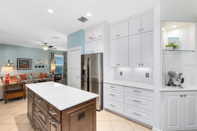 716 Timberwilde Ave, Winter Springs, FL 32708 - kitchen with stainless steel refrigerator with ice dispenser, light tile patterned flooring, white cabinetry, glass insert cabinets, and a ceiling fan