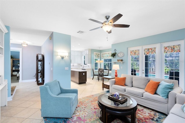 716 Timberwilde Ave, Winter Springs, FL 32708 - living area featuring light tile patterned floors and ceiling fan