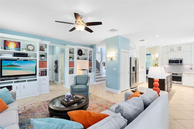 716 Timberwilde Ave, Winter Springs, FL 32708 - living area featuring light tile patterned floors, a ceiling fan, stairs, and recessed lighting