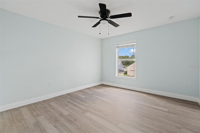 6905 Beargrass Rd, Harmony, FL 34773 - unfurnished room with light wood-style flooring and a ceiling fan