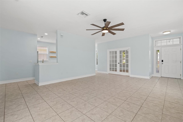 6905 Beargrass Rd, Harmony, FL 34773 - unfurnished living room featuring french doors, ceiling fan, light tile patterned floors, and recessed lighting