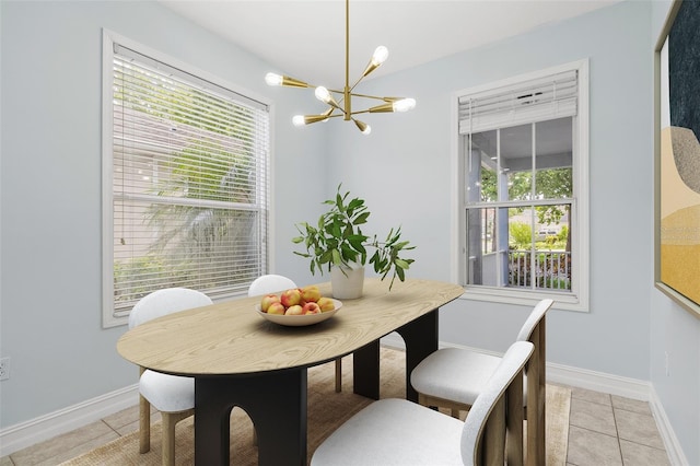 6905 Beargrass Rd, Harmony, FL 34773 - dining area featuring a chandelier and light tile patterned floors