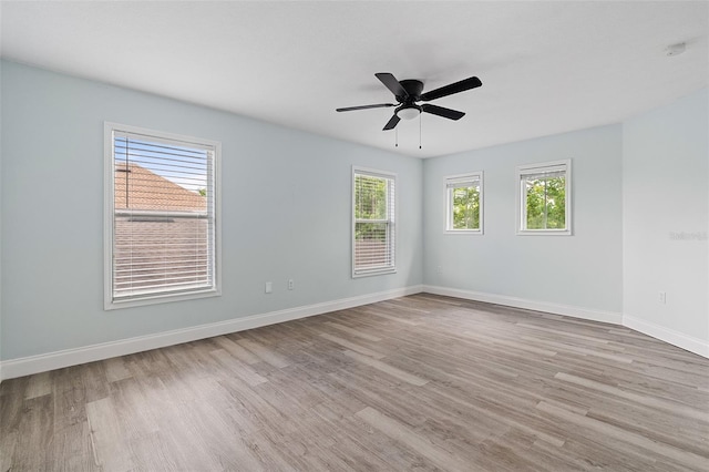 6905 Beargrass Rd, Harmony, FL 34773 - unfurnished room featuring wood finished floors and ceiling fan