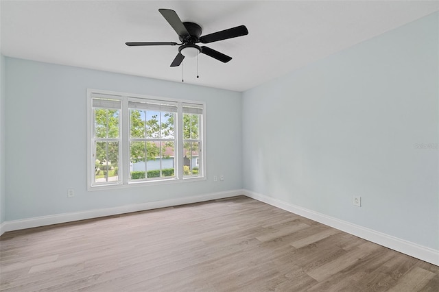 6905 Beargrass Rd, Harmony, FL 34773 - unfurnished room with wood finished floors and ceiling fan