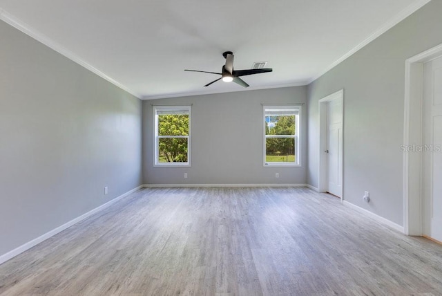 4361 Albritton Rd, Saint Cloud, FL 34772 - spare room featuring healthy amount of natural light, wood finished floors, a ceiling fan, and ornamental molding