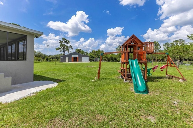 4361 Albritton Rd, Saint Cloud, FL 34772 - view of jungle gym with a yard and a sunroom