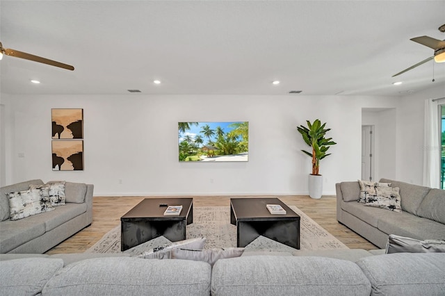 2525 Shanti Dr, Kissimmee, FL 34746 - living room with ceiling fan, light wood-type flooring, and recessed lighting