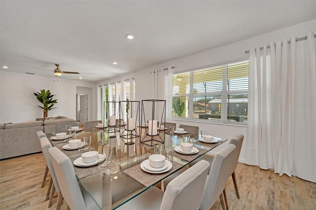 2525 Shanti Dr, Kissimmee, FL 34746 - dining area featuring light wood-type flooring, ceiling fan, and recessed lighting