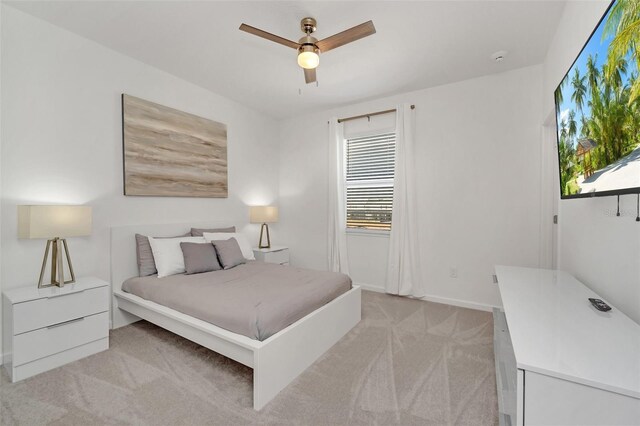 2525 Shanti Dr, Kissimmee, FL 34746 - bedroom featuring light carpet and ceiling fan