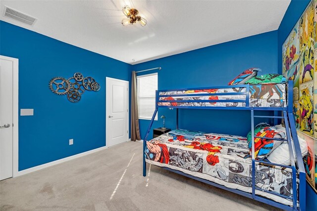 2525 Shanti Dr, Kissimmee, FL 34746 - carpeted bedroom featuring baseboards