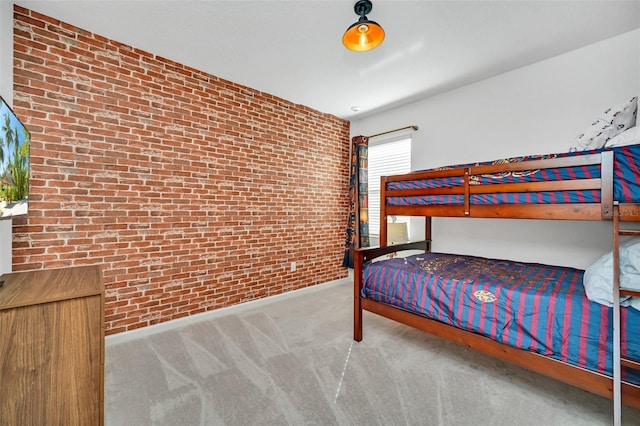 2525 Shanti Dr, Kissimmee, FL 34746 - bedroom with brick wall and carpet floors
