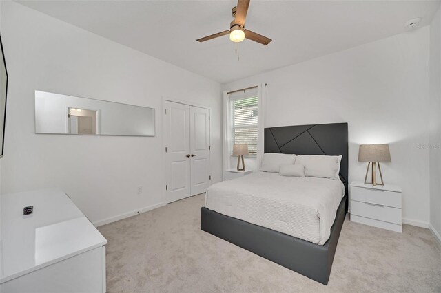 2525 Shanti Dr, Kissimmee, FL 34746 - bedroom with carpet, a closet, and ceiling fan