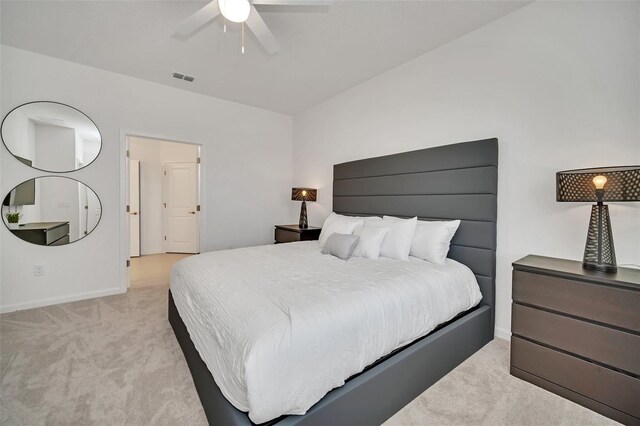 2525 Shanti Dr, Kissimmee, FL 34746 - bedroom with light colored carpet and ceiling fan