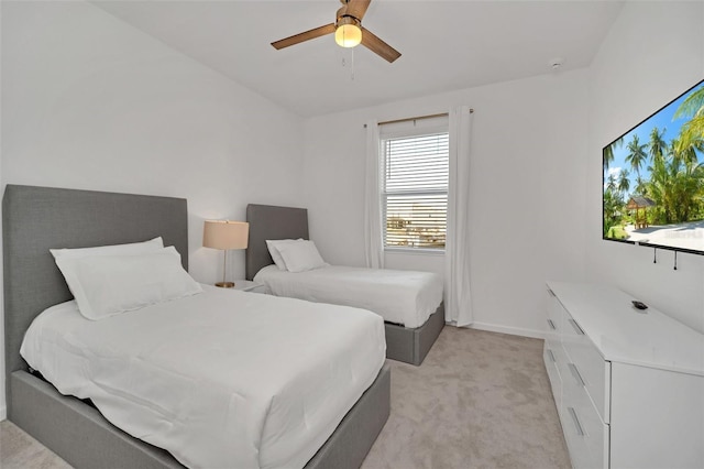 2525 Shanti Dr, Kissimmee, FL 34746 - bedroom featuring light colored carpet and ceiling fan
