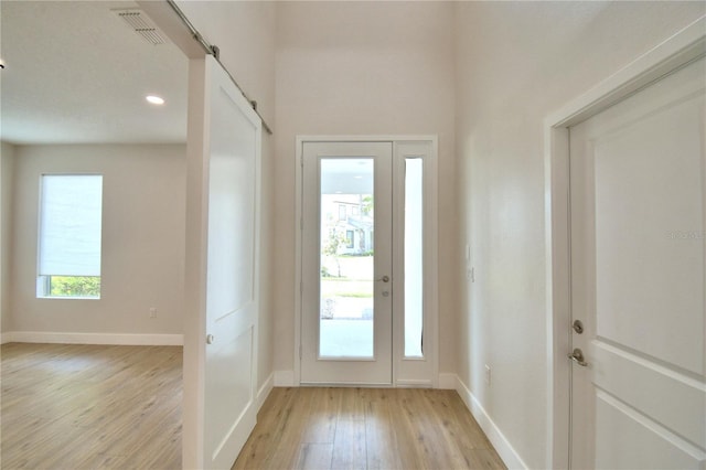 2673 Calistoga Ave, Kissimmee, FL 34741 - entryway featuring light wood-style flooring and recessed lighting