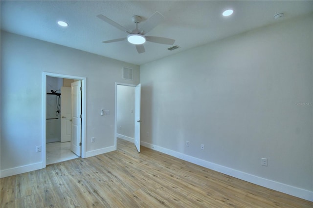 2673 Calistoga Ave, Kissimmee, FL 34741 - unfurnished bedroom featuring wood finished floors, recessed lighting, ensuite bath, and a ceiling fan