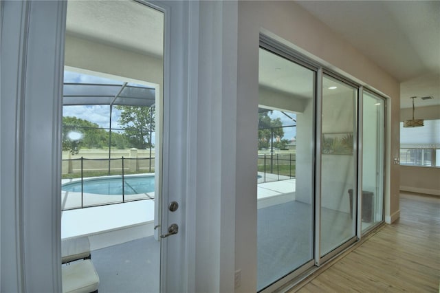 2673 Calistoga Ave, Kissimmee, FL 34741 - entryway featuring light wood-style flooring and baseboards
