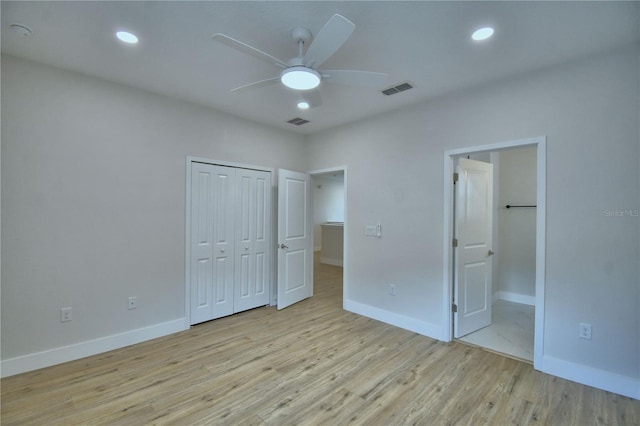 2673 Calistoga Ave, Kissimmee, FL 34741 - unfurnished bedroom with light wood-type flooring, ensuite bath, recessed lighting, a closet, and a ceiling fan