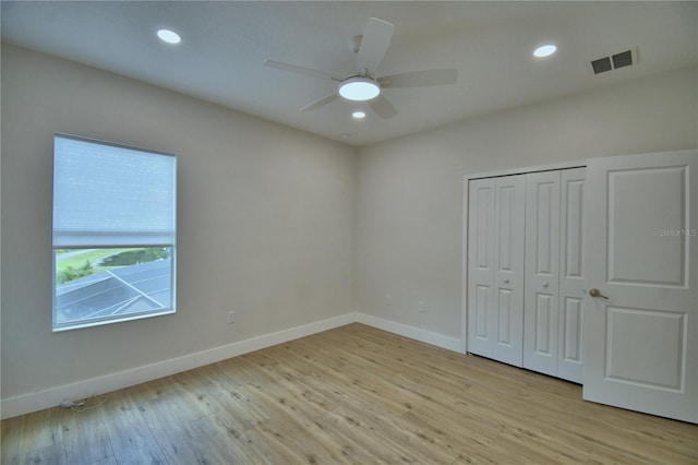 2673 Calistoga Ave, Kissimmee, FL 34741 - unfurnished bedroom featuring light wood-style flooring, a closet, recessed lighting, and a ceiling fan