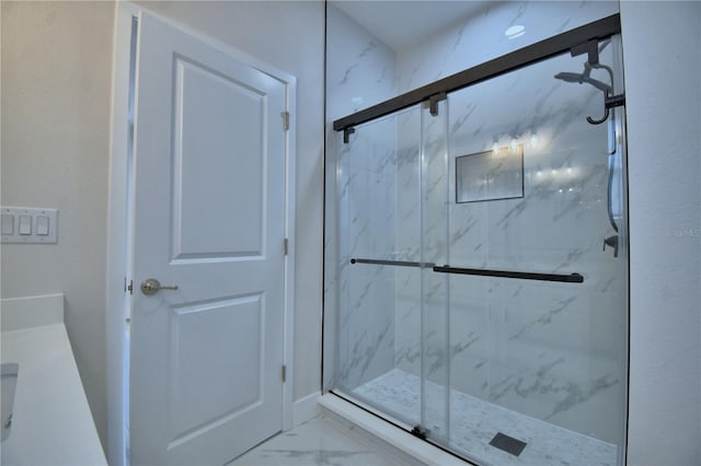 2673 Calistoga Ave, Kissimmee, FL 34741 - bathroom featuring marble finish floors and a marble finish shower