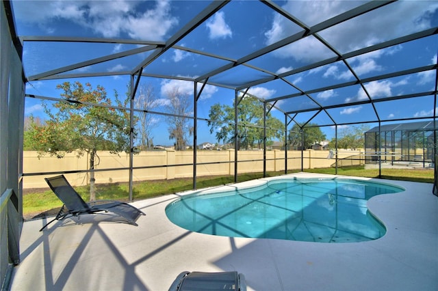 2673 Calistoga Ave, Kissimmee, FL 34741 - view of pool featuring a fenced backyard, a patio area, and glass enclosure