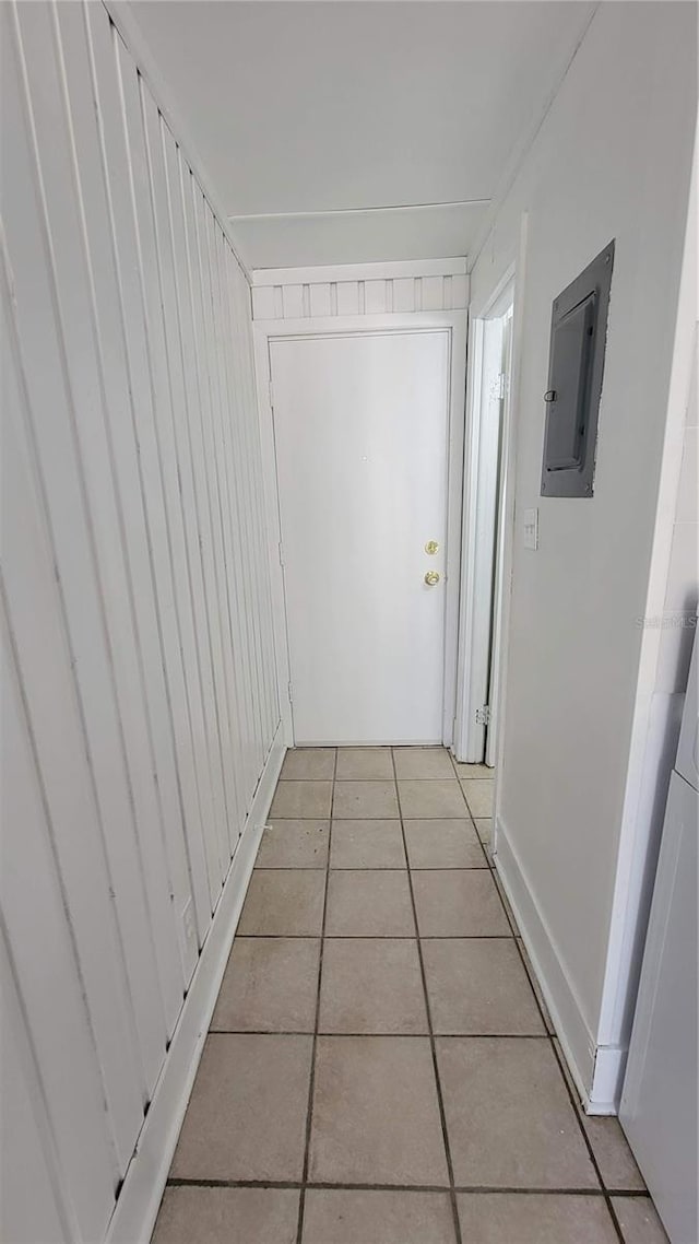 10301 US Highway 27 Unit 94B, Clermont, FL 34711 - hallway featuring electric panel and light tile patterned flooring