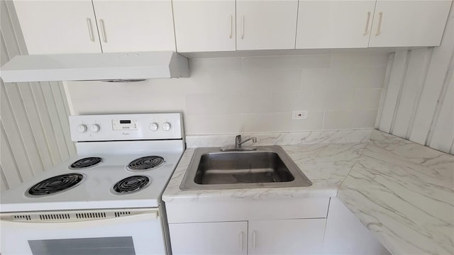10301 US Highway 27 Unit 94B, Clermont, FL 34711 - kitchen with white electric range oven, range hood, white cabinets, and tasteful backsplash