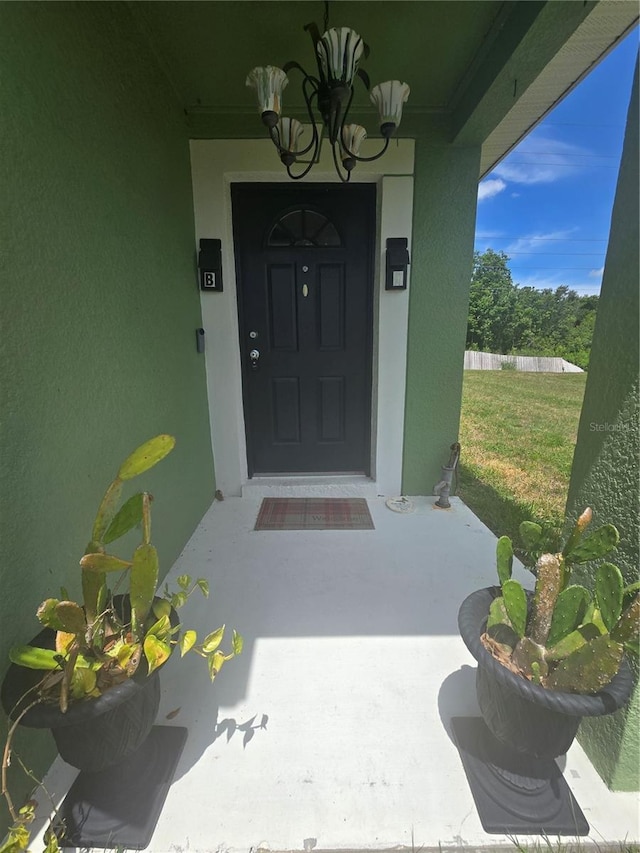 204 Canary Island Cir, Davenport, FL 33837 - view of exterior entry featuring stucco siding