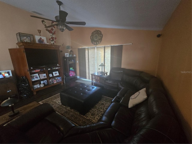 204 Canary Island Cir, Davenport, FL 33837 - living area with ceiling fan, a textured ceiling, and wood finished floors