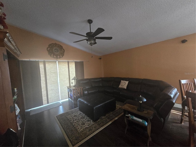 204 Canary Island Cir, Davenport, FL 33837 - living area featuring ceiling fan, wood finished floors, lofted ceiling, and a textured ceiling