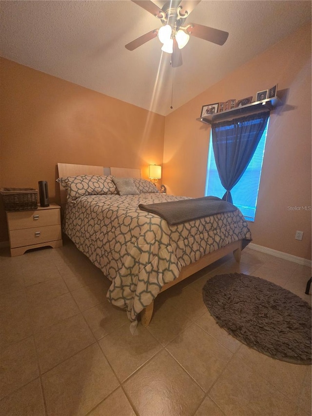 204 Canary Island Cir, Davenport, FL 33837 - tiled bedroom featuring vaulted ceiling and a ceiling fan