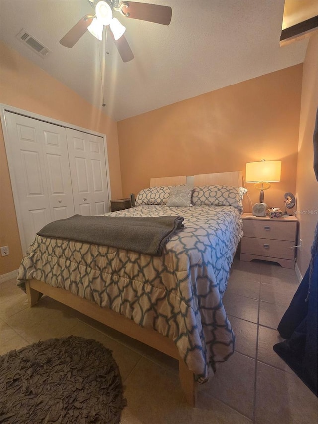204 Canary Island Cir, Davenport, FL 33837 - tiled bedroom with lofted ceiling, a closet, and ceiling fan