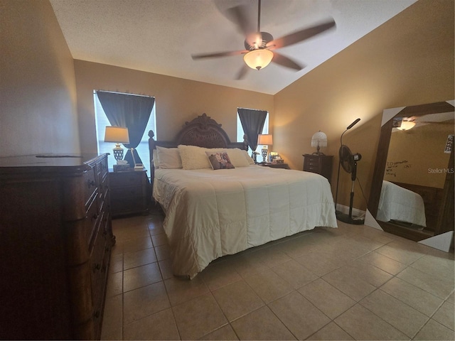204 Canary Island Cir, Davenport, FL 33837 - tiled bedroom with multiple windows, a ceiling fan, and vaulted ceiling